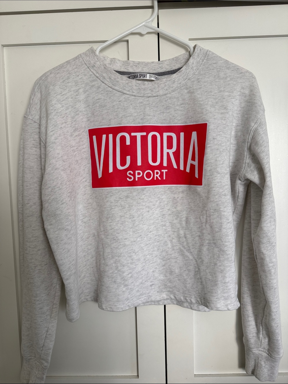 Victoria Sport Light Gray Crewneck Sweatshirt with Bold Red Logo